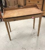 A Victorian pine two drawer side table on square tapered legs, 83 cm wide x 52 cm deep x 77 cm high,