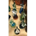A collection of seven Mdina and Mdina style seahorse paperweights, some signed, ranging from 17.