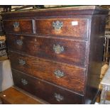 An 18th Century oak chest,