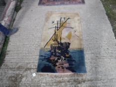 An Art Deco Chinese rug with ship design in yellow and blue colour way approx.