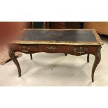 A circa 1900 French kingwood and brass embellished bureau plat in the Louis XV taste,