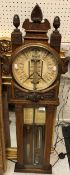 A carved oak cased "Improved Torricelli" mercury barometer thermometer,