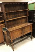 A pine farmhouse style kitchen table on a stained beech base with single end drawer,