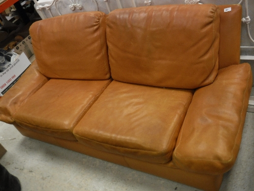A Burov orange leather upholstered sofa,