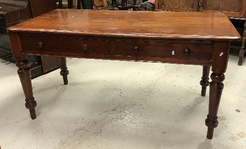 A Victorian mahogany writing table,