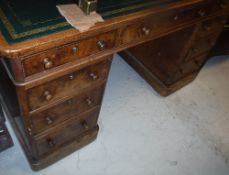 A Victorian walnut double pedestal desk,