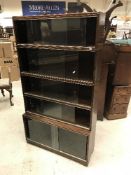 A Minty mahogany and glazed set of ten stacking bookcases with sliding doors in two sections (2 x