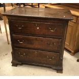 An early 19th Century oak chest,