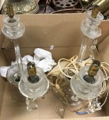 A pair of early 20th Century cut glass table lamps (A/F),