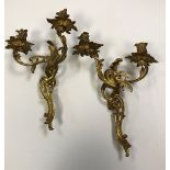 A pair of 19th Century gilt bronze wall sconces of scrolling acanthus form in the Louis XV taste,