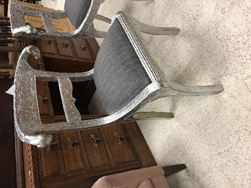 A pair of Continental embossed silver coloured metal covered bar back chairs with ram's head - Image 2 of 21