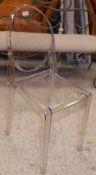 A set of six Kartell "Victoria Ghost" clear perspex chairs, designed by Philippe Starck,