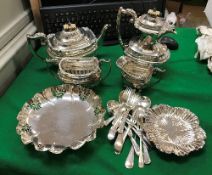 A four piece Walker & Hall plated tea set comprising teapot, water jug,