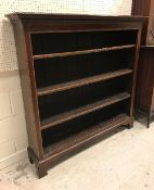 An Edwardian mahogany and satinwood banded open bookcase with three adjustable shelves,