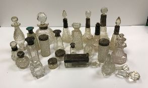 Various cut glass silver mounted and other scent and dressing table bottles, various dates, makers,