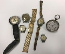 A collection of wristwatches to include Timex, Rone, Smiths, etc and a silver cased pocket watch,