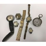 A collection of wristwatches to include Timex, Rone, Smiths, etc and a silver cased pocket watch,