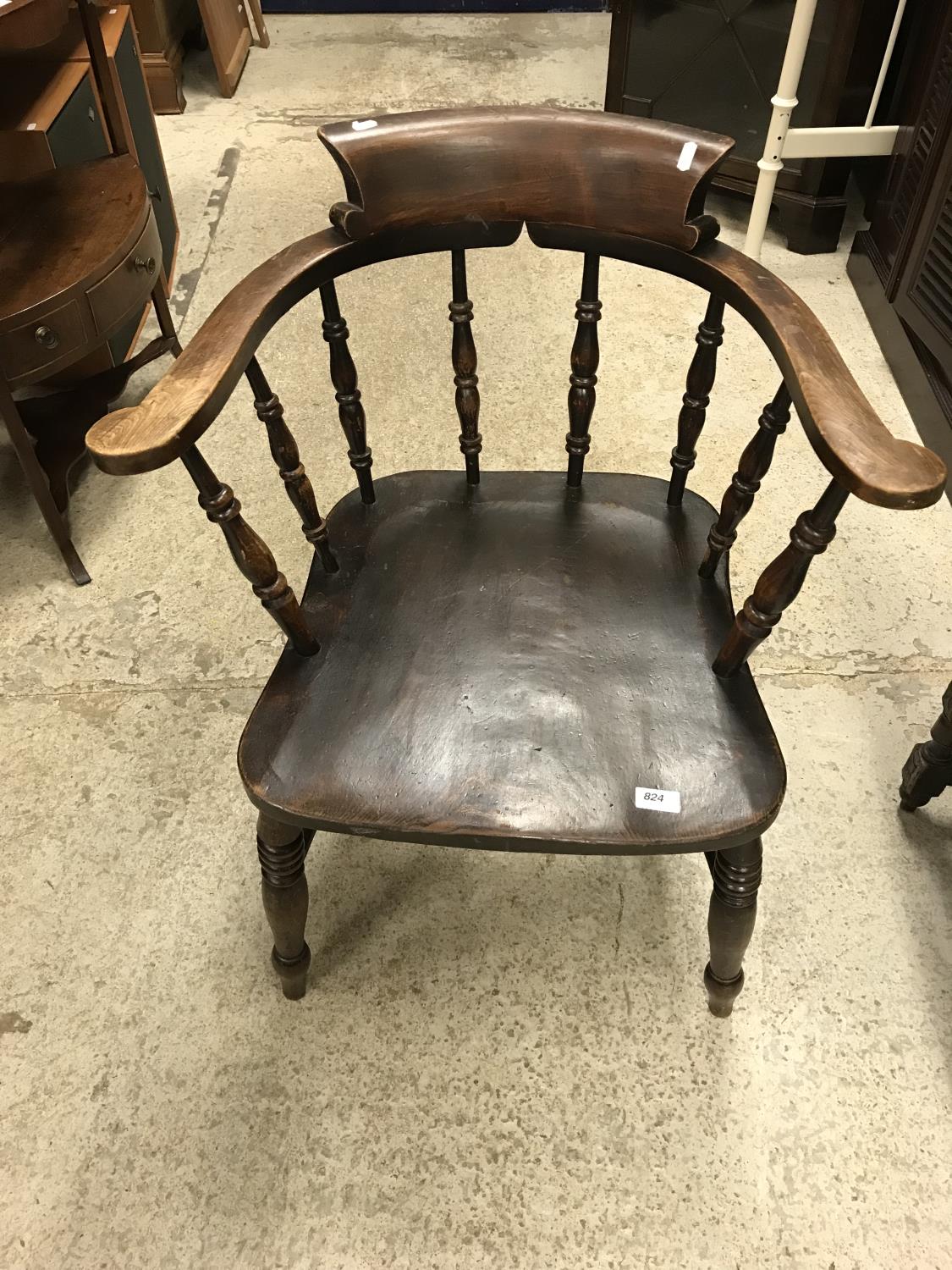 A set of eight early 20th Century stained beech and elm smoker's bow chairs with spindle backs and - Image 11 of 12