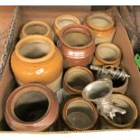 A box containing various stoneware storage jars and a box of assorted kitchenalia,
