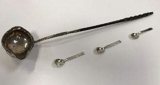 A set of three Danish mustard spoons inscribed "HNILS Sterling Denmark" to back,