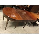 A 19th Century mahogany D-end dining table in the Regency style,