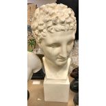 A 20th Century painted plaster bust of a Classical male figure on an integral block base,