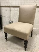 A Victorian child's upholstered prie a dieu chair on turned front legs to peg feet,