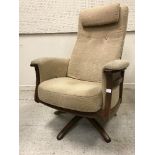 An Ercol "Gina" elm framed reclining armchair in E081 fabric, circa 25 6 15,