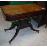 A George III mahogany tea table, the top rosewood strung and with reeded edge,