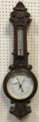 A circa 1900 oak cased barometer thermometer, 71.