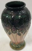 A modern Moorcroft vase decorated in the seccessionist style 25.