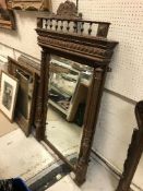 A circa 1900 Dutch oak framed pier glass or overmantel mirror with bevel edge plate, 87.