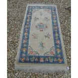 A circa 1920 Chinese superwash rug, the