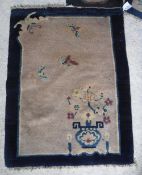 Three various Chinese rugs, one with vas