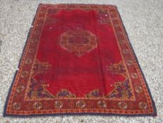 A Turkish style rug, the central panel s