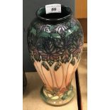 A modern Moorcroft vase decorated in the