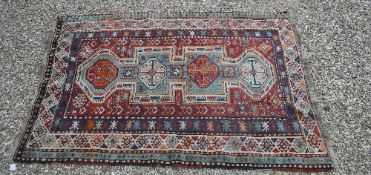 A Kasak carpet, the central panel set wi