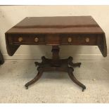 A Regency mahogany sofa table, the round