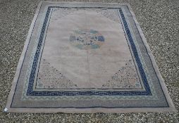 A 1920's Chinese carpet, the central pan