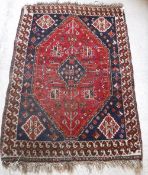 A Shiraz rug with lozenge shaped medalli