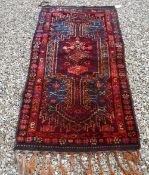 A modern Turkish prayer rug, the central