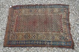 An Afshan rug, the central panel set wit