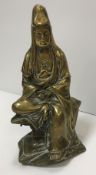 A Chinese bronze figure of Guan Yin seat