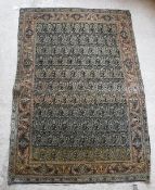 A Kashan rug with all over leaf decorati