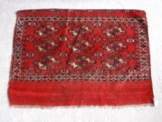 A Bokhara Juval rug with repeating medal