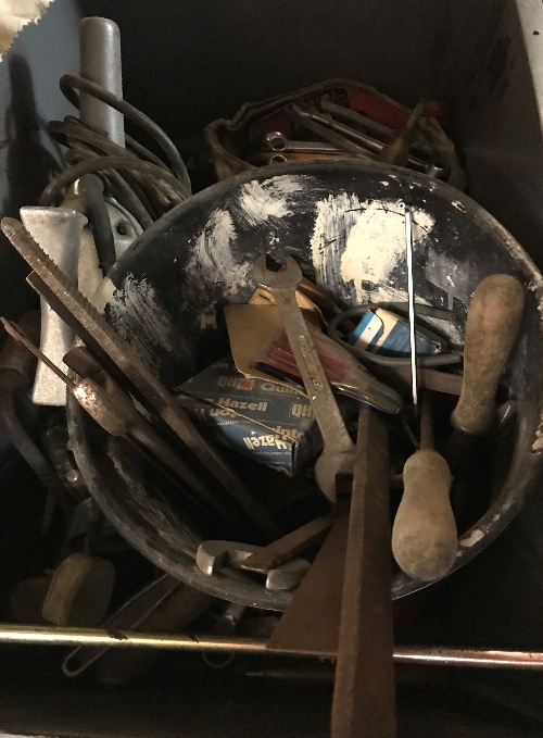 A box of assorted hand tools to include