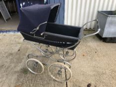 A Silver Cross pram on chrome plated sup