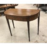 A Regency mahogany bow fronted tea table