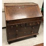 A 19th Century oak bureau, the plain top