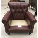 A modern buttoned leather upholstered sc